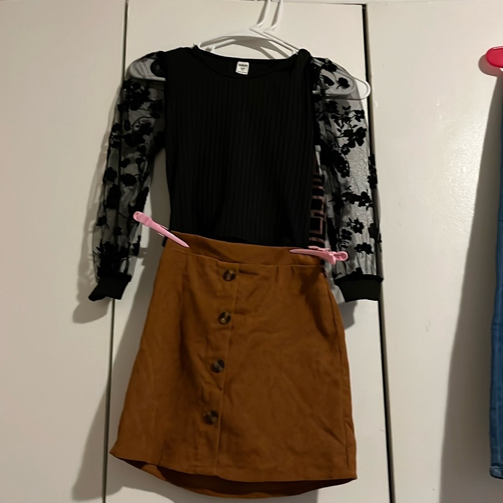 two piece girls outfit black long sleeve with see through sleeves with a skirt